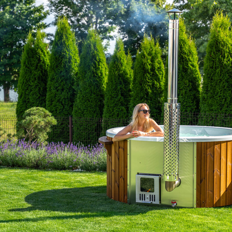 Acrylic hot tub with integrated heater and thermo wood cladding