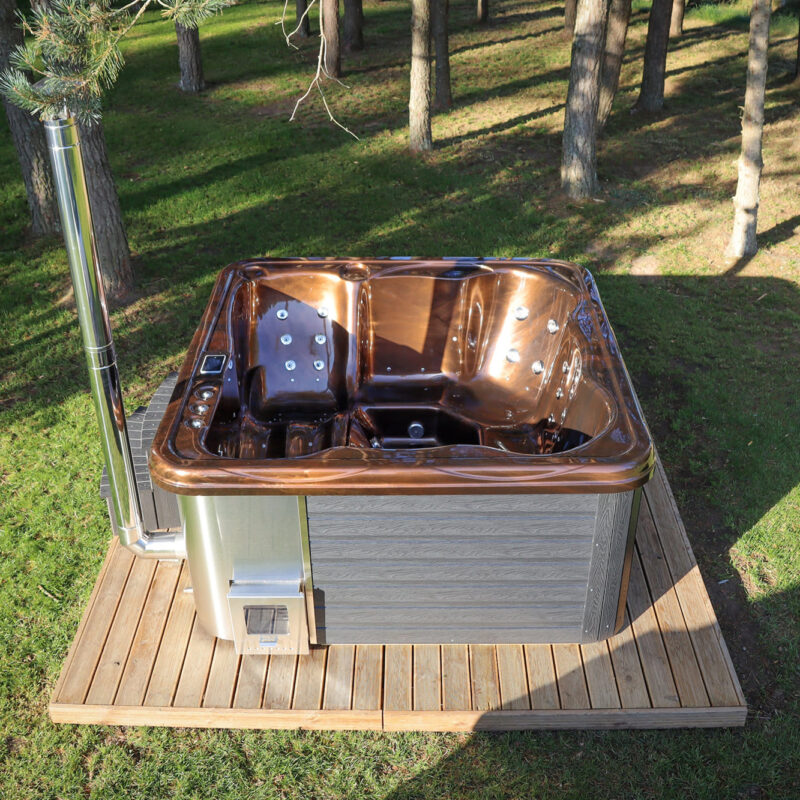 Jacuzzi hot tub with integrated wood fired heater and wpc cladding