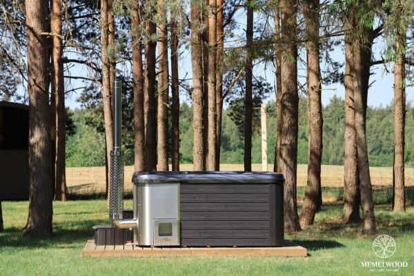 Jacuzzi hot tub with integrated wood fired heater and wpc cladding