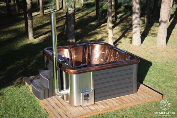 Jacuzzi hot tub with integrated wood fired heater and wpc cladding