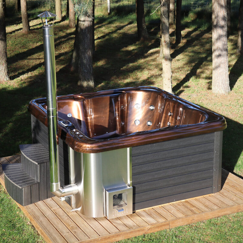 Jacuzzi hot tub with integrated wood fired heater and wpc cladding